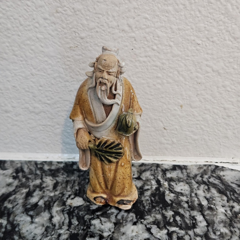 Chinese Mudman Figurine Yellow White Statue Collectible, holding a fan and Mango